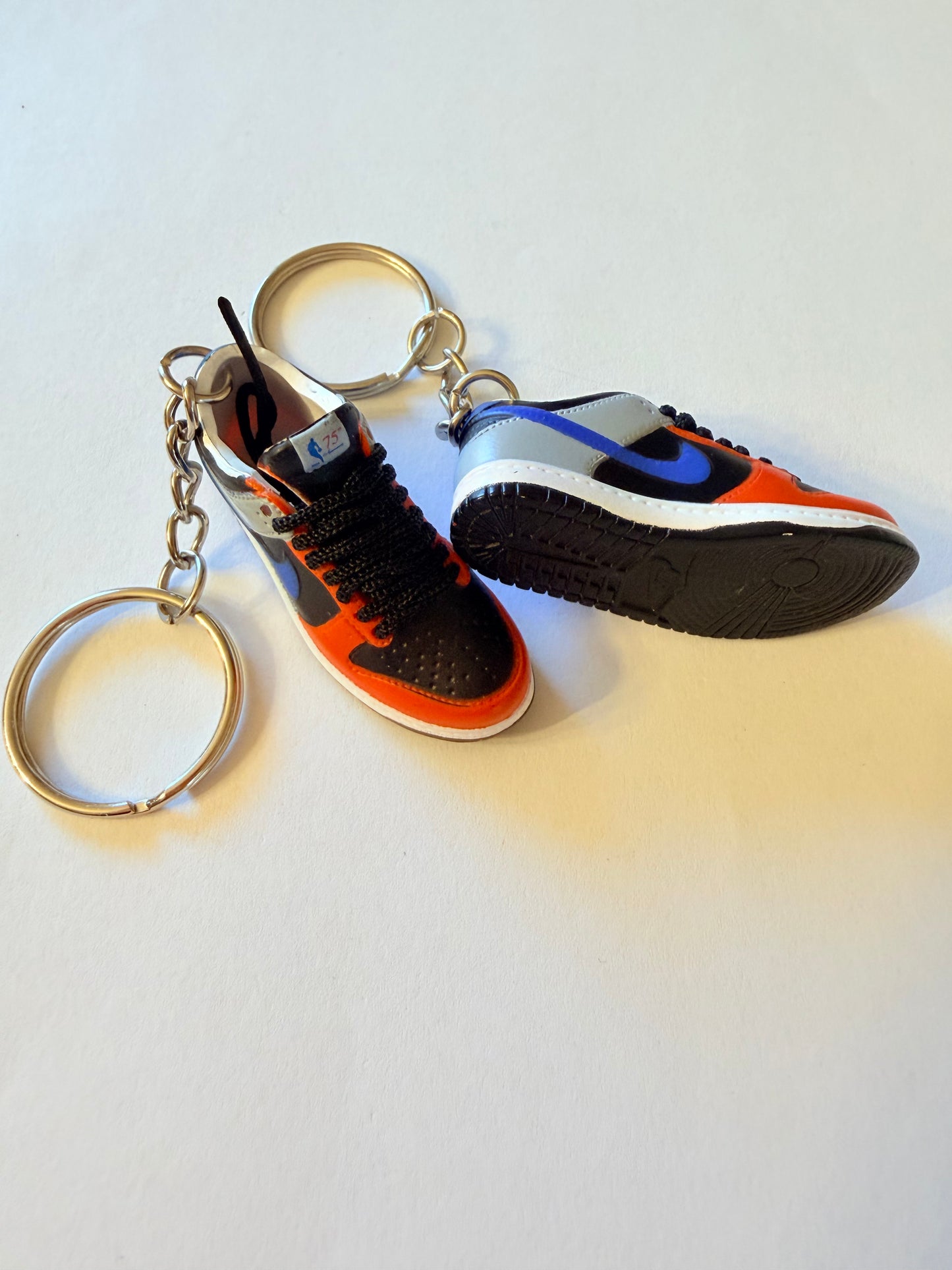 “Riot Edition Mini Sneaker Keychain Set – Red/Blue Colorway”